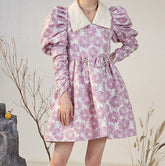 Vestido de jacquard con margaritas y mangas abullonadas